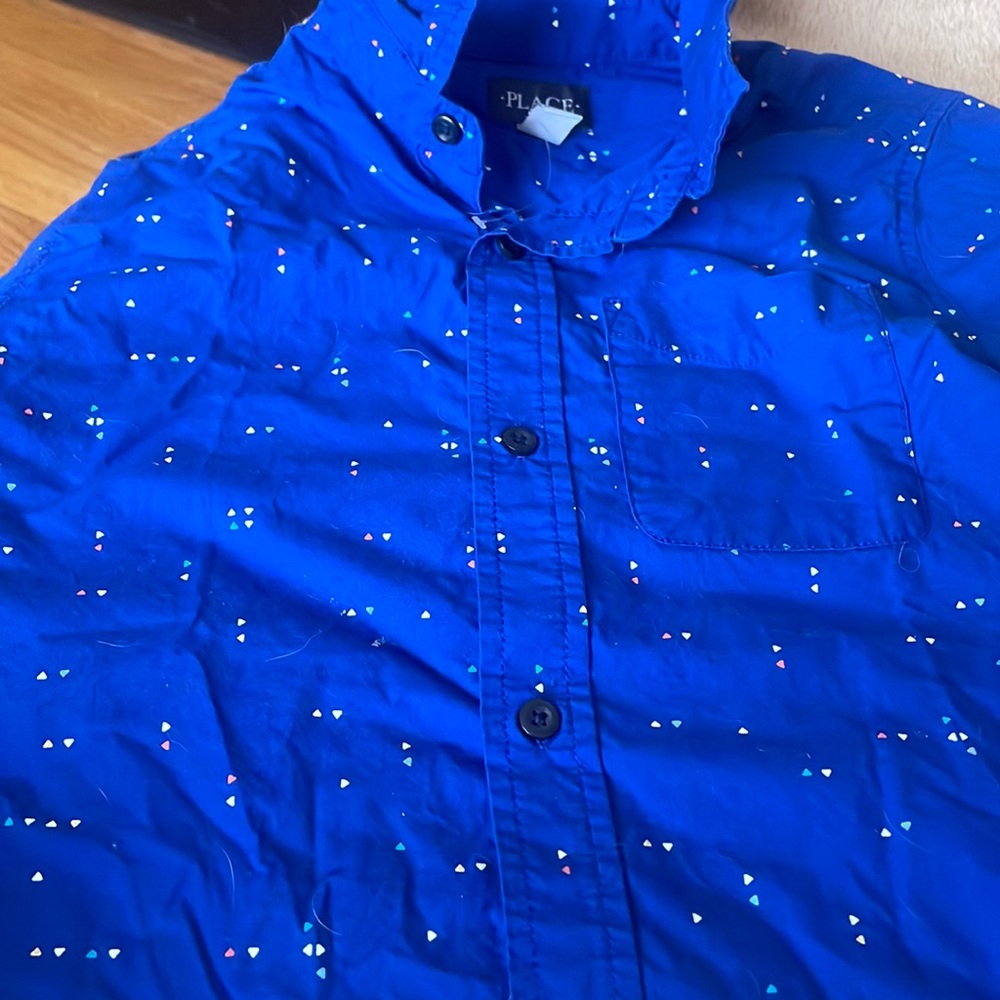 Children place shirts that blue